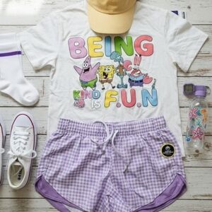 White Graphic Tee with Cartoon Characters And Matching Shorts